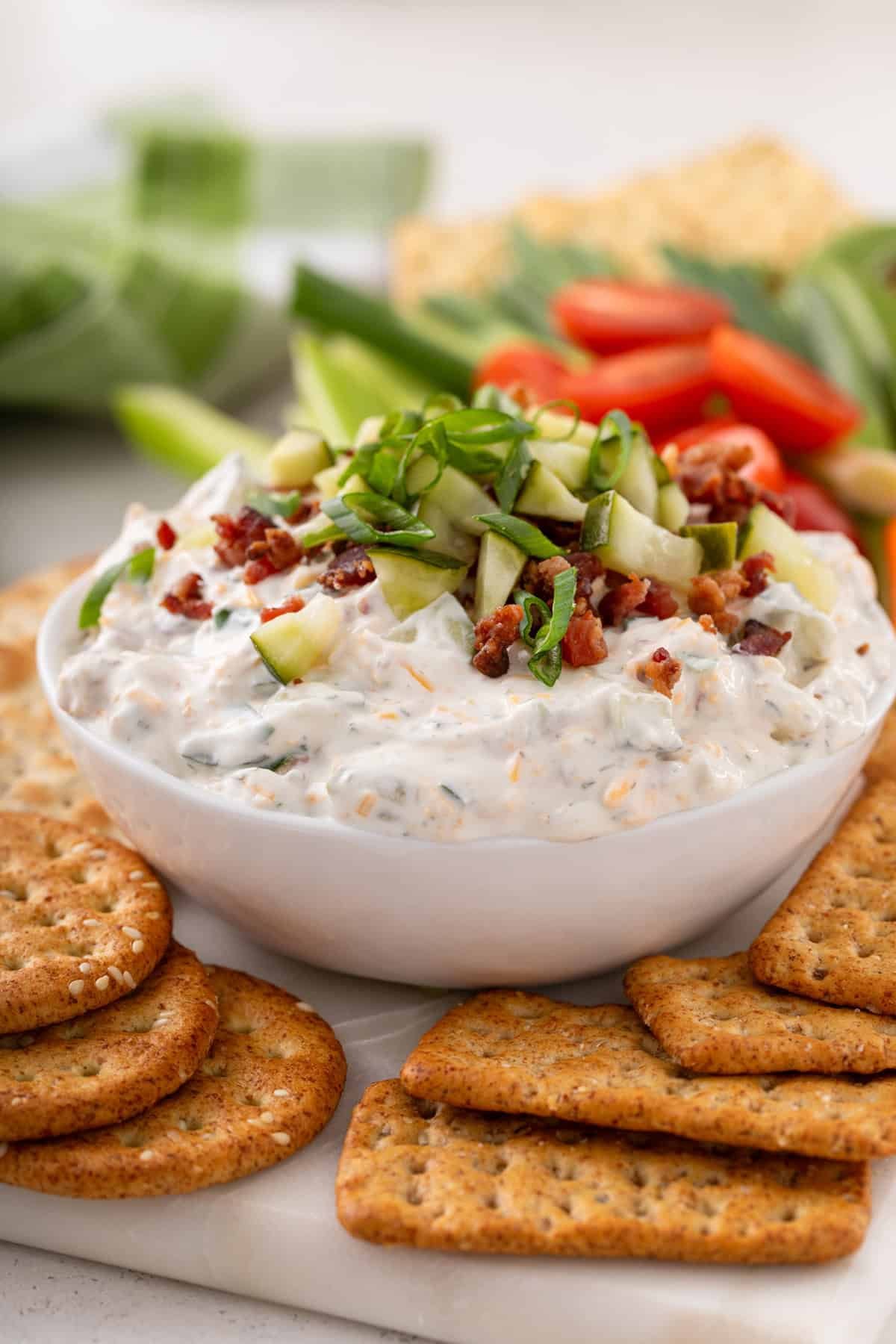 Side view of a white bowl filled with Grillo's pickle dip.