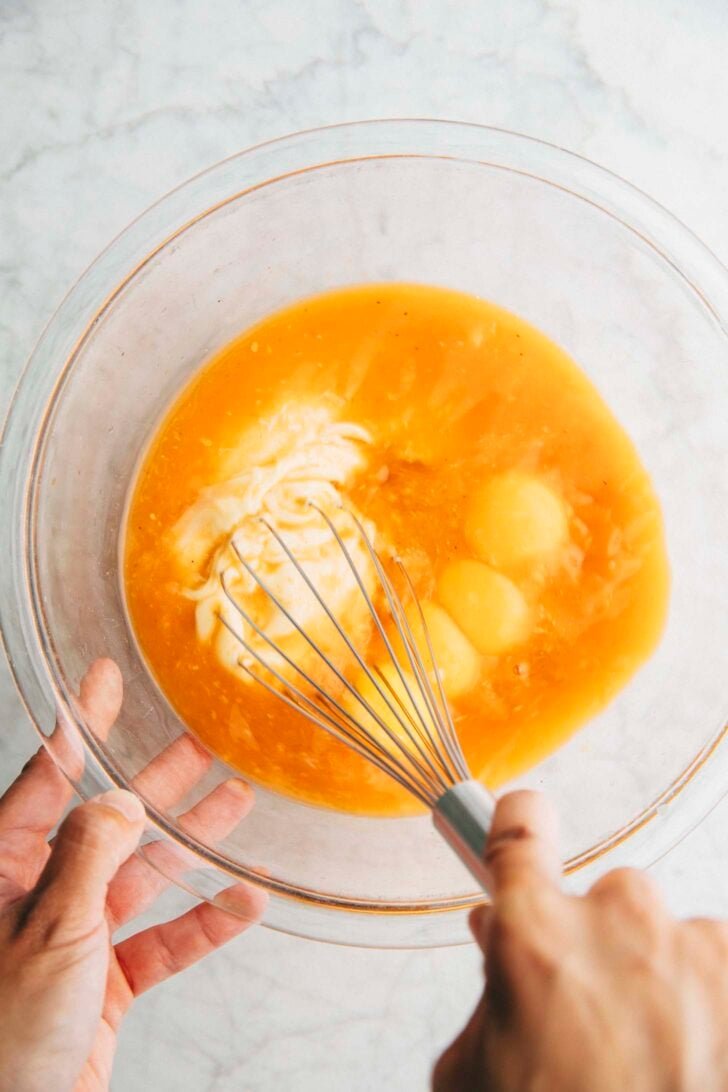 photo of Michelle from Hummingbird High whisking the ingredients for thai tea pie filling