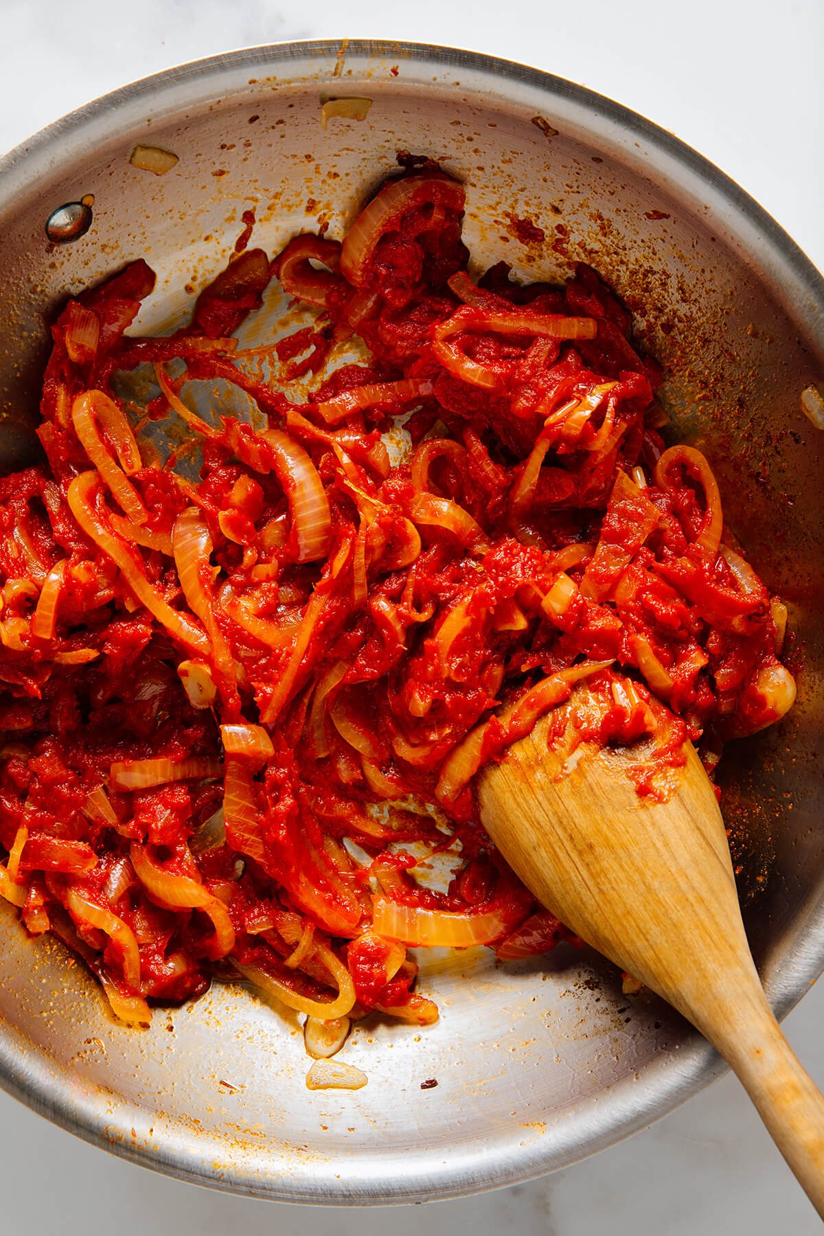 cooking onions with tomato paste