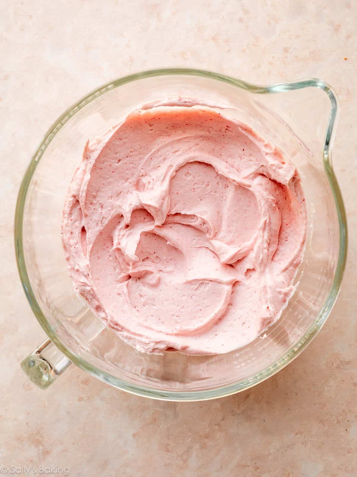 fluffy whipped strawberry mixture in bowl.