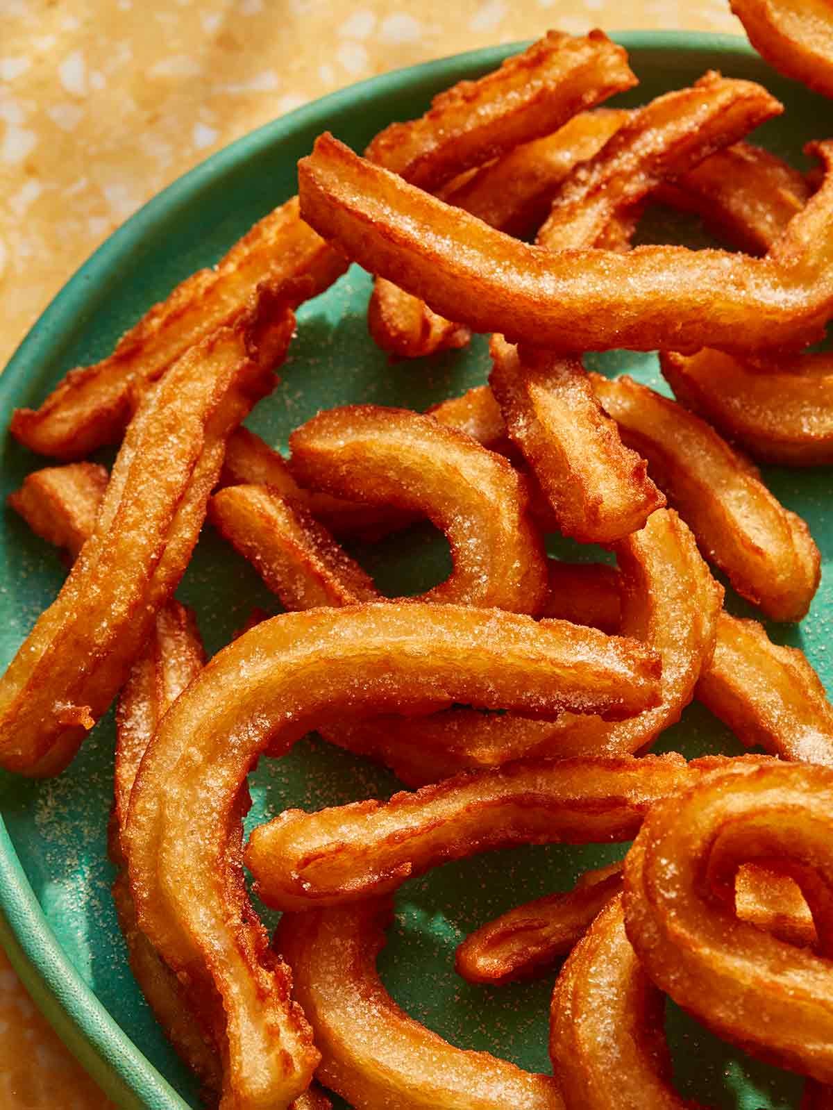 Close up on a plate of Spanish Churros.