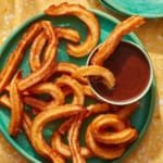 Spanish Churros with chocolate sauce on the side.