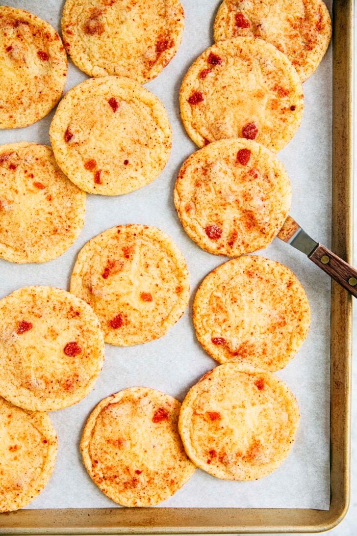 photo showing strawberry doodle cookies on sheet pan