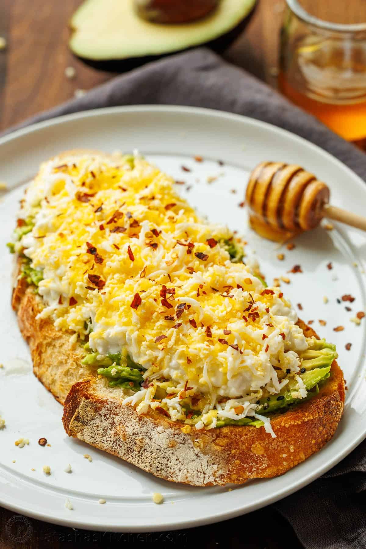 High protein avocado toast with egg and cottage cheese on sourdough bread