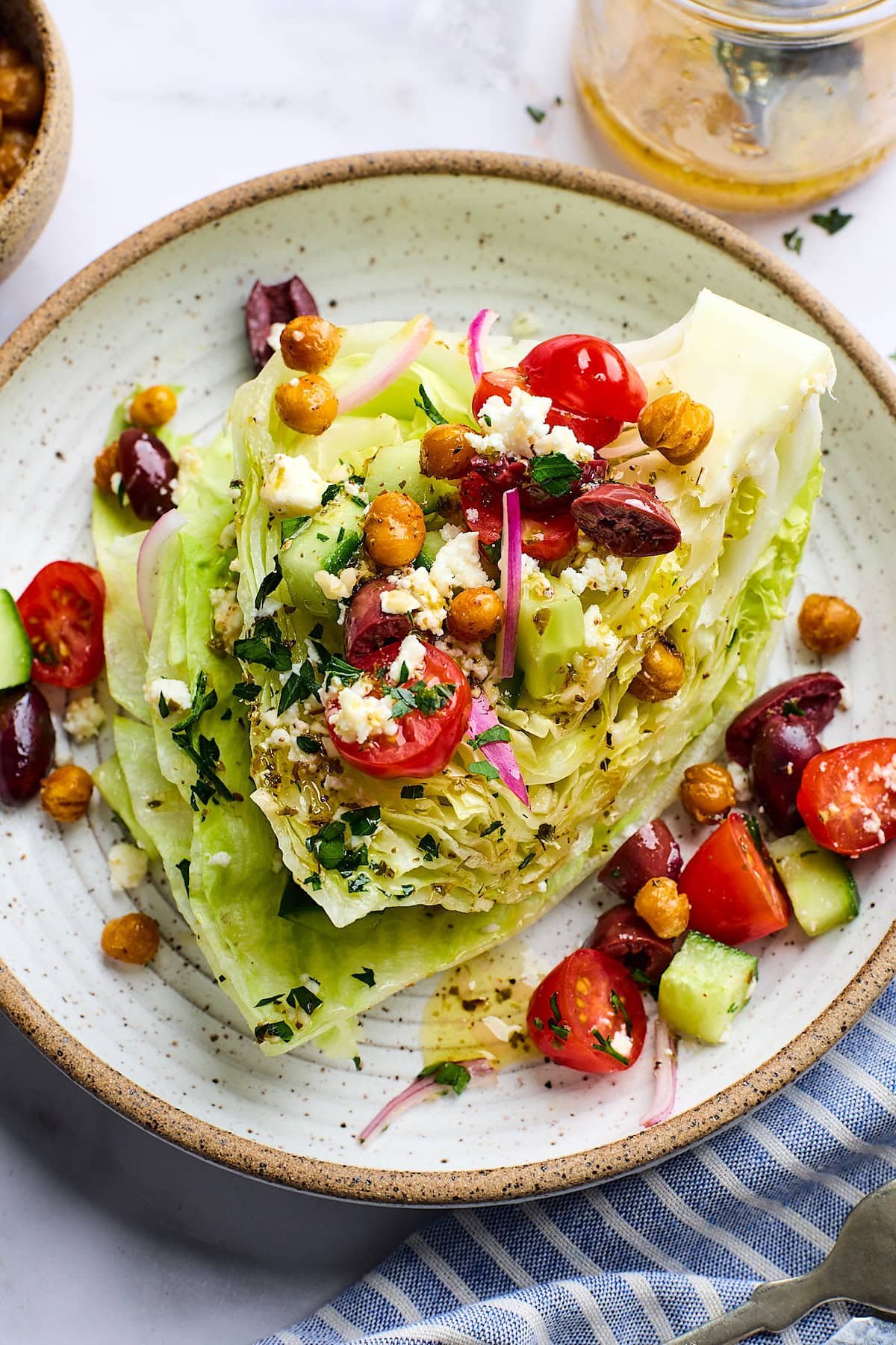 Greek wedge salad on plate.