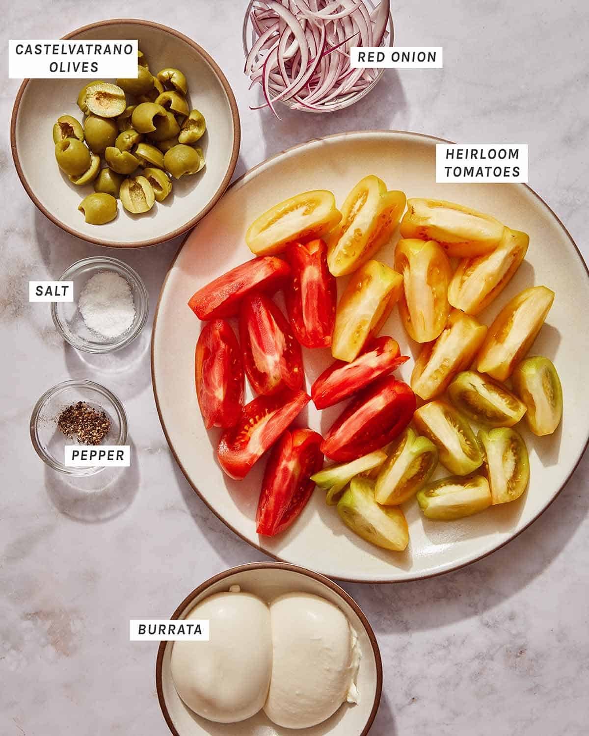 Ingredients for a tomato salad recipe.