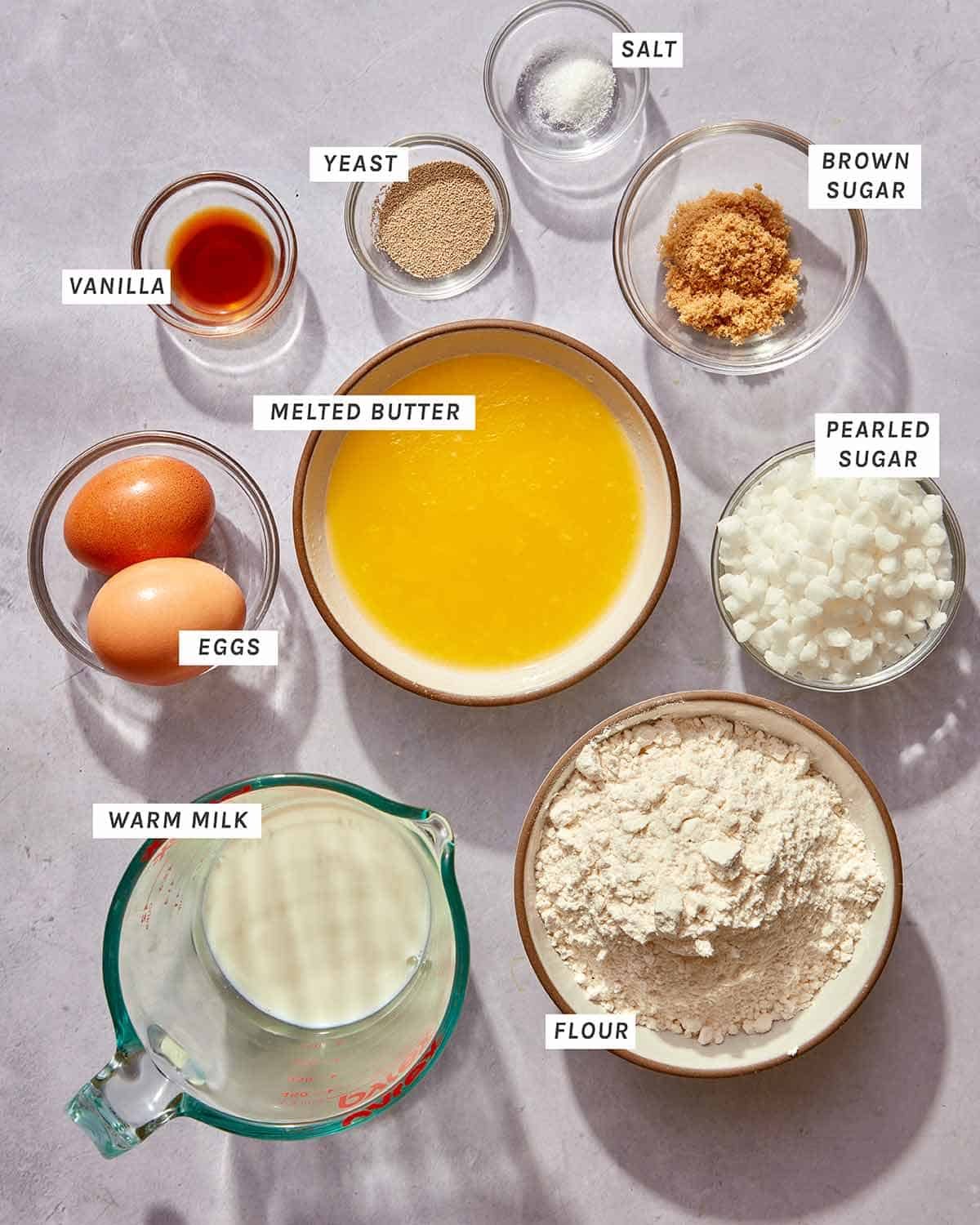 Liege waffle ingredients all measured out on a kitchen counter.
