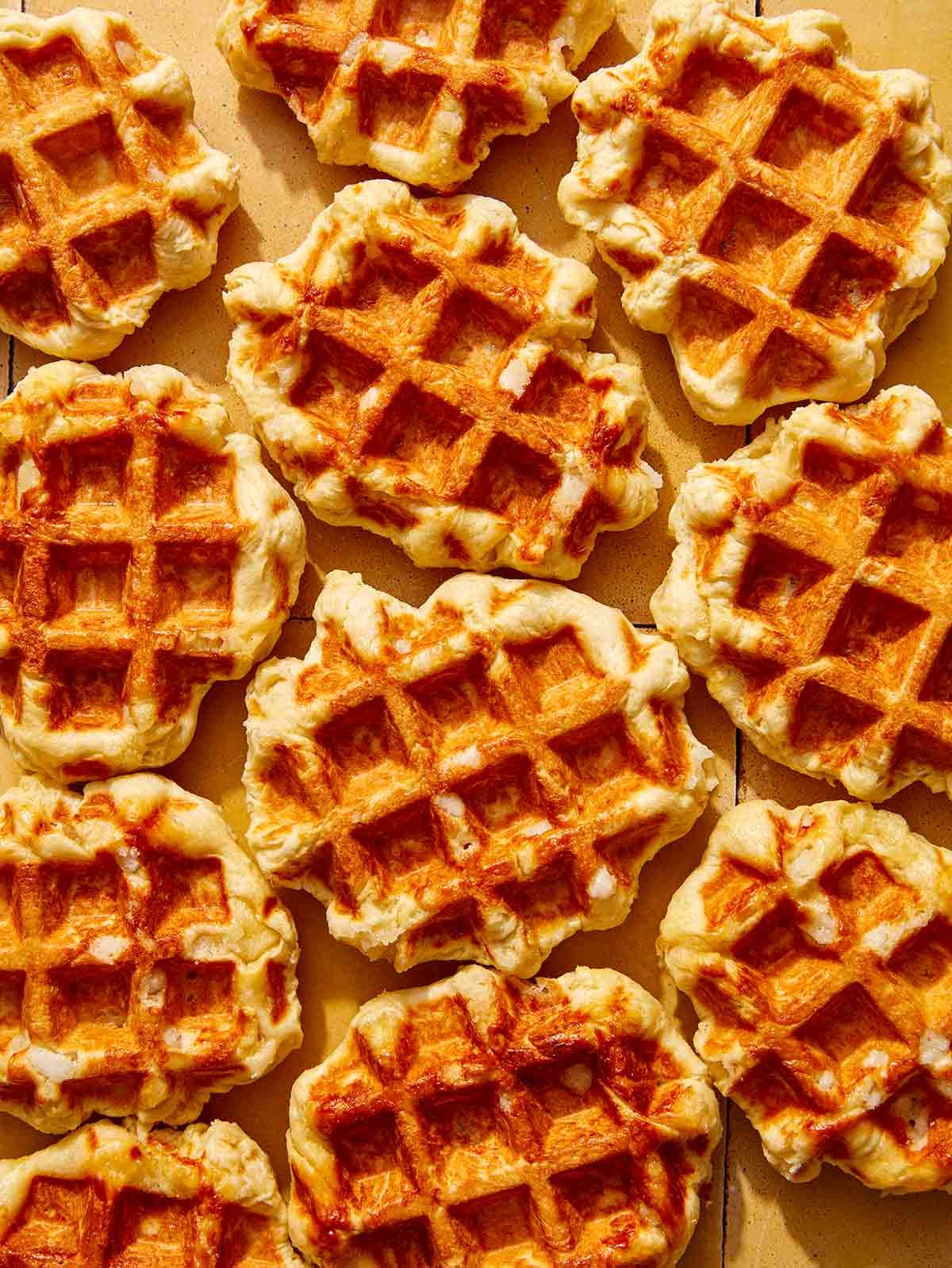 Liege waffles freshly made on a kitchen counter.