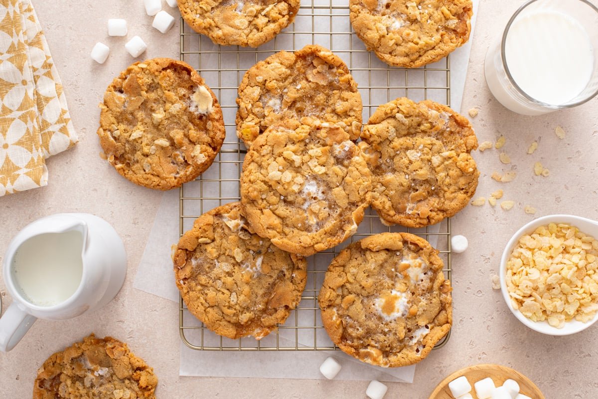 Overhead view of rice krispie cookies cooling on a wire rack.