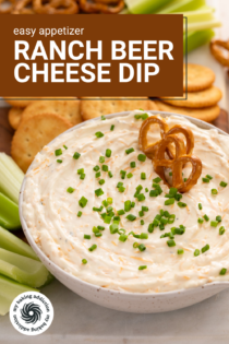 Two pretzel twists tucked into beer cheese dip in a white bowl. Text overlay includes recipe name.