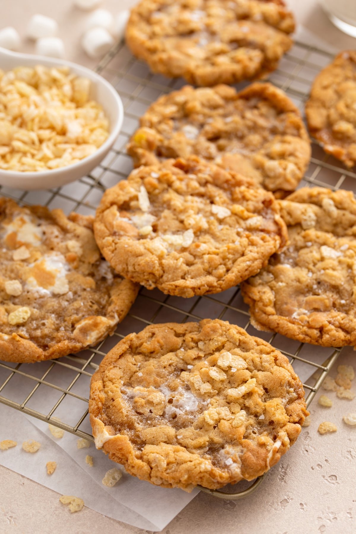 Rice krispie cookies arranged on a wire rack.