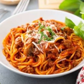 Bowl of one-pot spaghetti on a gray countertop