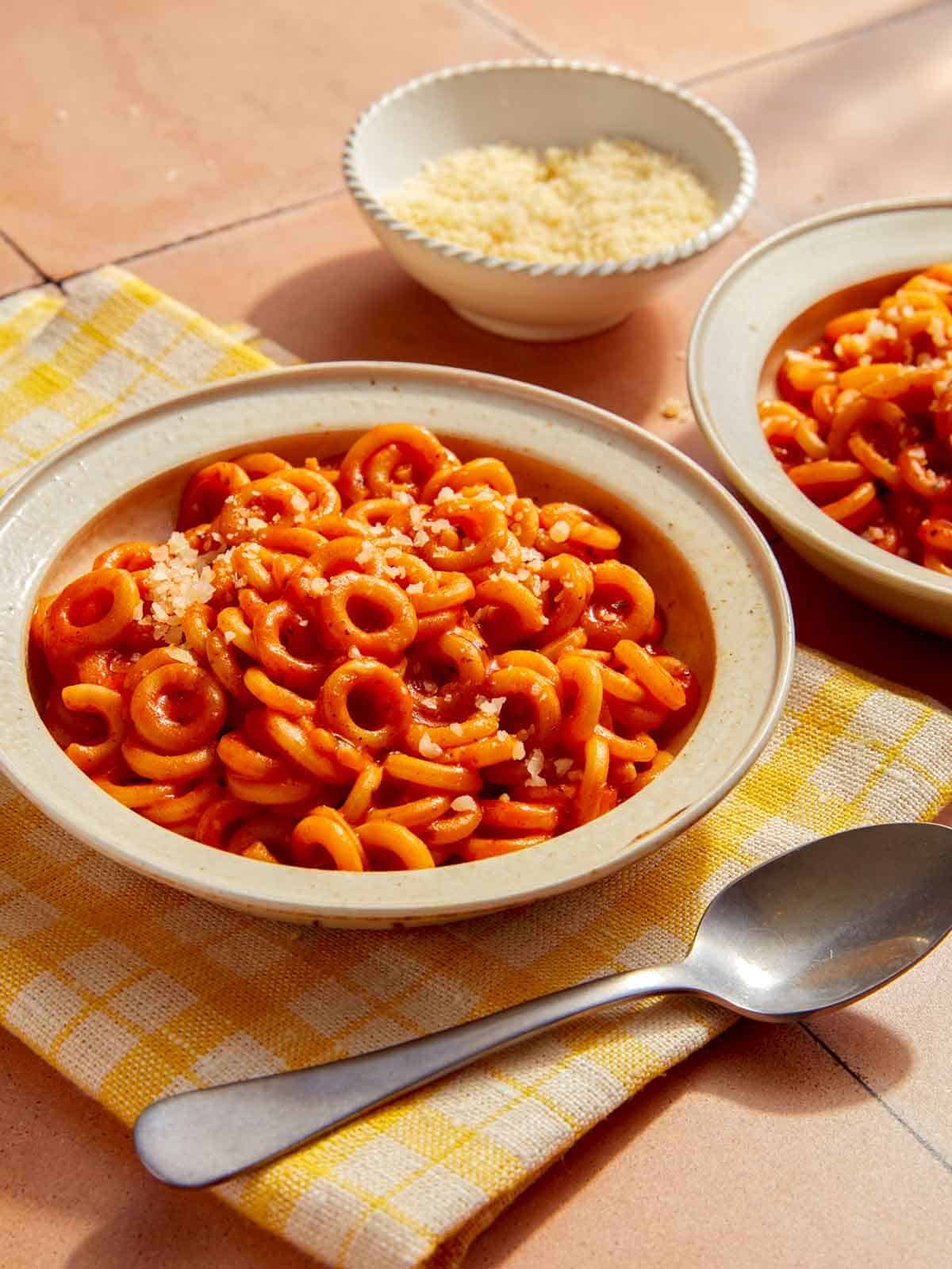 Spaghetti Os in two bowls ready to be eaten.