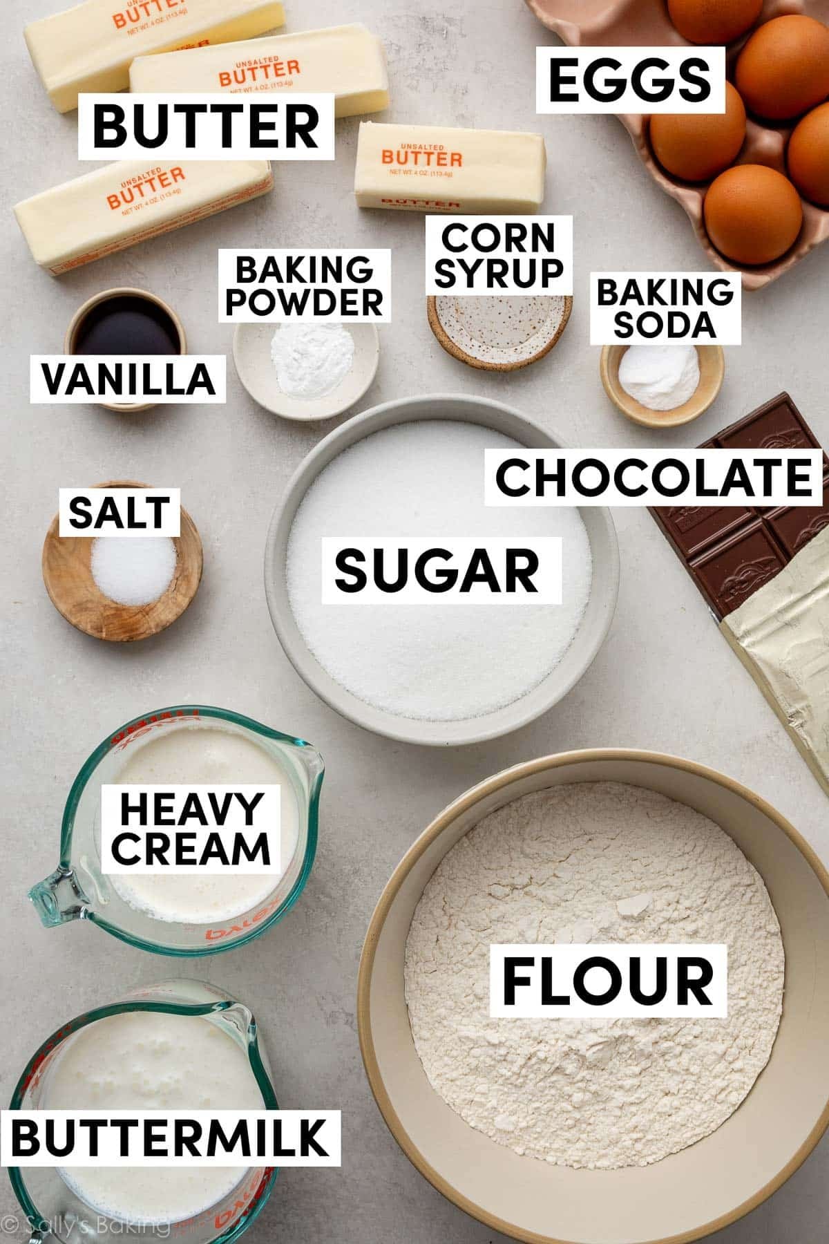 ingredients measured in bowls including sugar, flour, heavy cream, salt, baking powder, corn syrup, and vanilla.
