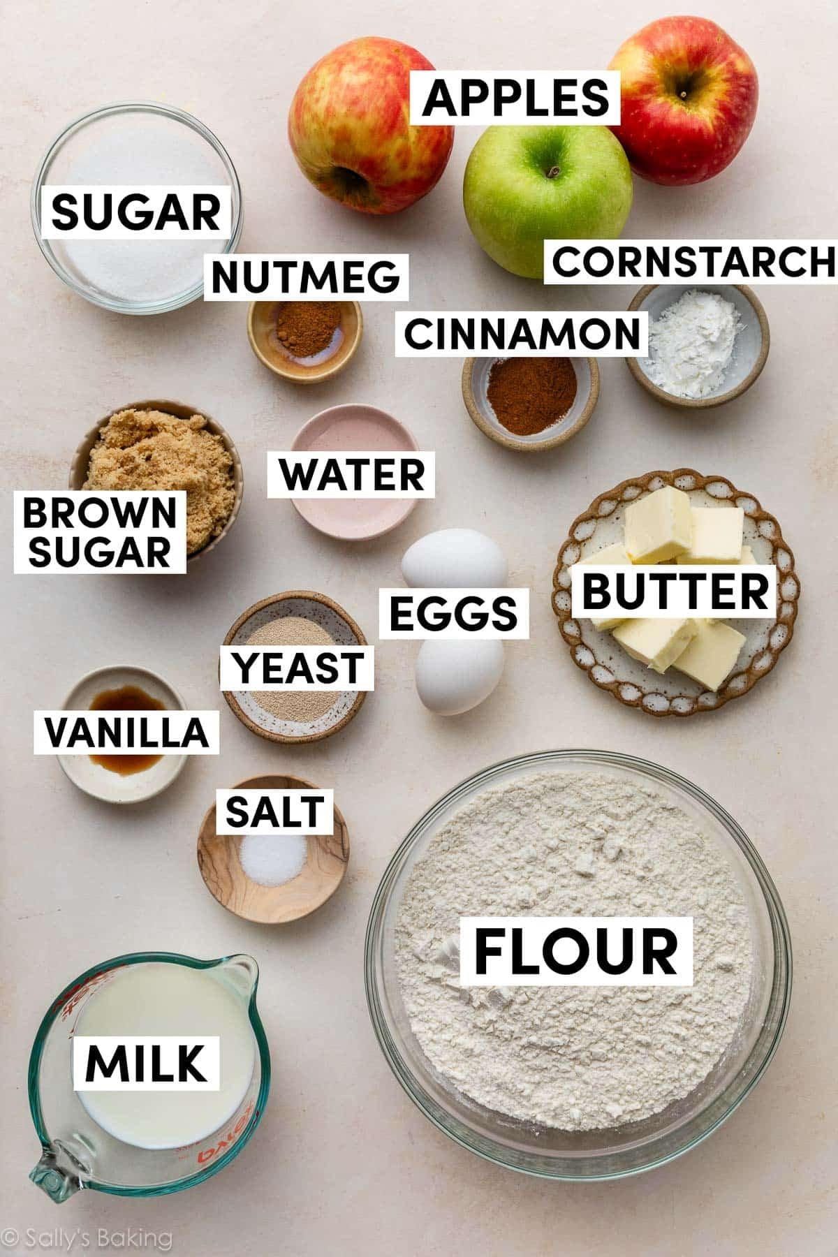 ingredients in bowls including flour, butter, milk, vanilla, brown sugar, water, and yeast.