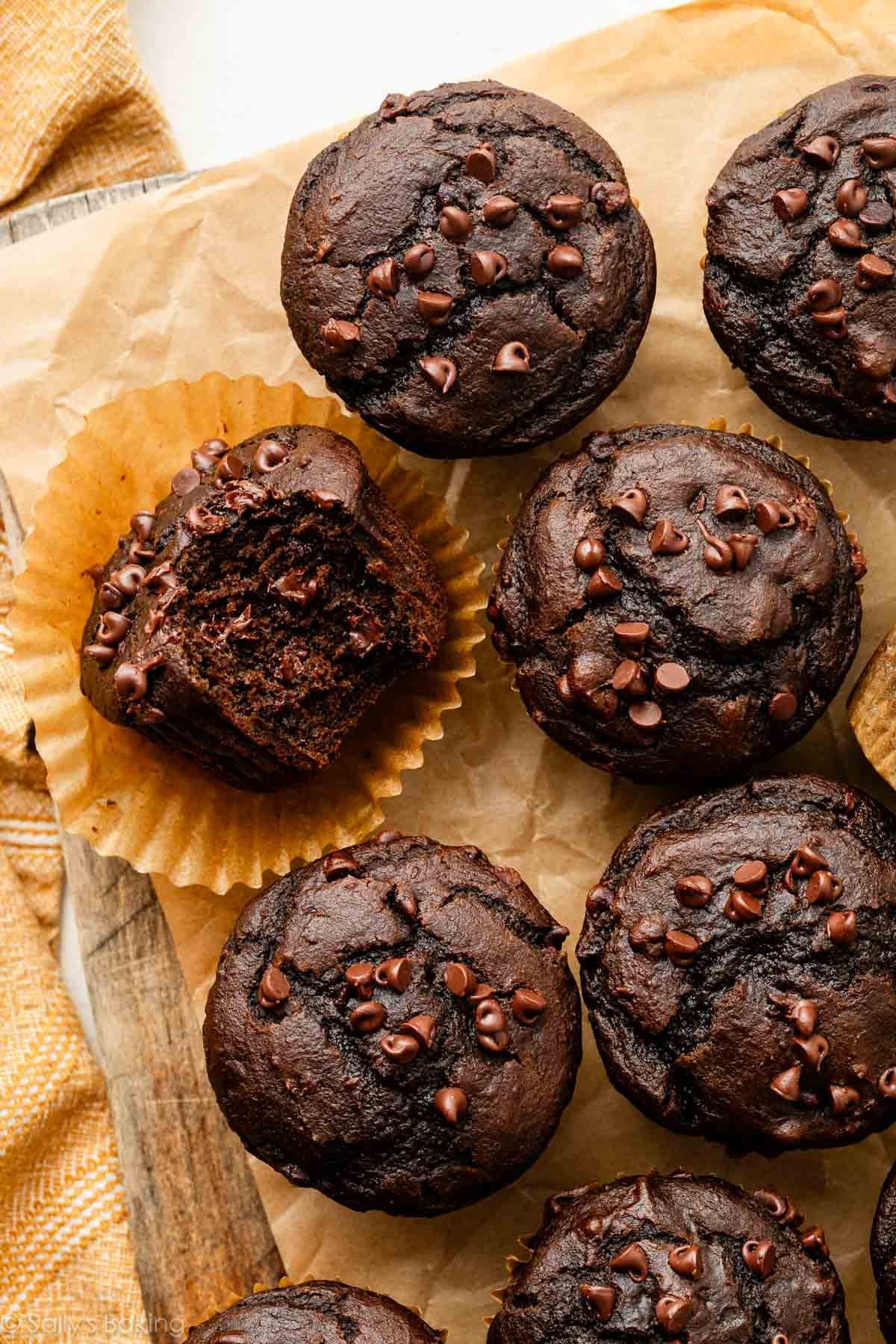 chocolate pumpkin muffins on parchment paper.